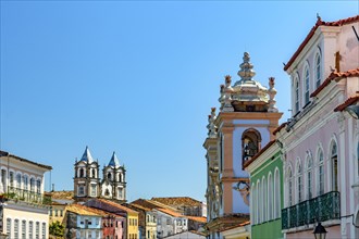 Colorful facades and historic church towers in baroque and colonial style in the famous Pelourinho neighborhood of Salvador