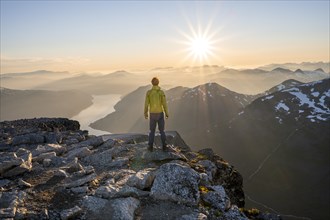 Hiker looking into the sunset