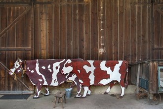 Two wooden cows