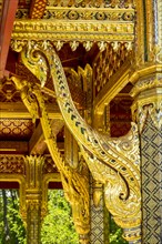 Gold-coloured swan-neck-shaped decoration in the Siamese Temple Sala-Thai II in the spa garden Bad Homburg vor der Hoehe