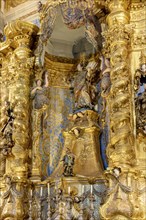 Gold-plated baroque altar in old and historic church in Pelourinho district