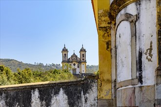 Two of the many historic churches in Baroque and colonial style from the 18th century in the city of Ouro Preto in Minas Gerais