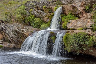 Beautifull waterfall between the rocks of Serra do Biribiri state park in Diamantina