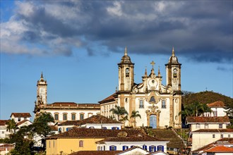 Old church on top of the hill and between the houses in the city of Ouro Preto in Minas Gerais