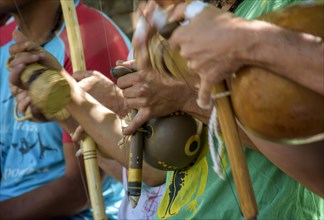 Brazilian musical instruments called berimbau and atabaque usually used during capoeira fight brought from africa and modified by the slaves