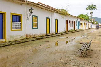 Sand street and old houses in colonial style on the streets of the old and historic city of Paraty founded in the 17th century on the coast of the state of Rio de Janeiro