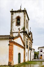 Old baroque church in the dirt streets of the historic city of Paraty in the state of Rio de Janeiro
