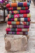 Pile of typical handmade fabrics from northern Argentina