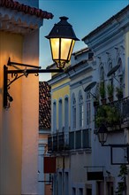 Beautiful street with historic colonial style houses and lantern in Pelourinho in Salvador