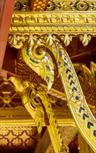 Gold-coloured swan-neck-shaped decoration in the Siamese Temple Sala-Thai II in the spa garden Bad Homburg vor der Hoehe