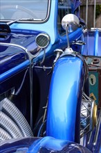 Detail of ancient blue car in perfect condition