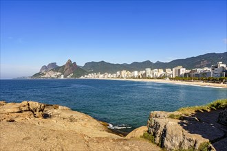 Panorama of Ipanema beach in Rio de Janeiro on a beautiful day with the sea