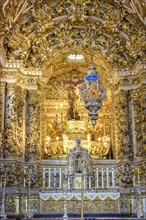 Beautiful gold-plated baroque altar in old and historic church in Pelourinho district