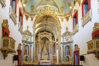 Altar of the church of Sao Pedro dos Clerigos created in the 18th century with its neoclassical style interior painted in gold in the Pelourinho neighborhood of Salvador