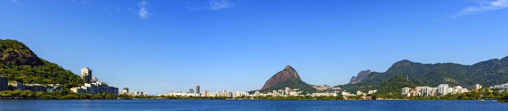 Panoramic image of the famous Rodrigo de Freitas lagoon in Rio de Janeiro surrounded by the city