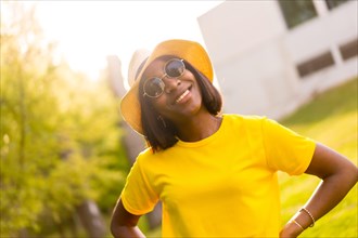 Yellow Hues: A Stunning Black Woman Embraces the Magic of Summer in the Forest