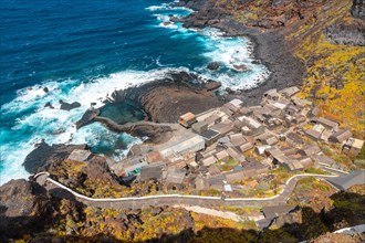 View from above of the fishing village of Pozo de las Calcosas on the island of El Hierro. Canary Islands