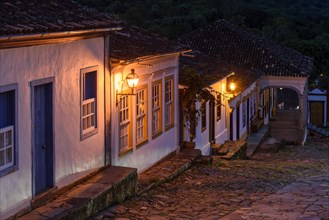 Night image of a street with cobblestones and colonial-style houses in the old town of Tiradentes in Minas Gerais