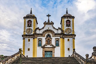 Facade of old historic church in baroque style in Ouro Preto city