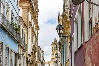 Old street and aged houses facades in historic Pelourinho district in Salvador