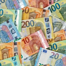 Euro banknotes save money finances background pay pay banknotes square in Stuttgart