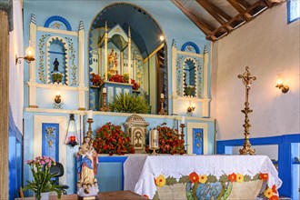 Old and historic altar inside an 18th century Christian chapel in Lagoa Santa