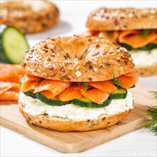 Bagel sandwich for breakfast topped with salmon fish square in Stuttgart