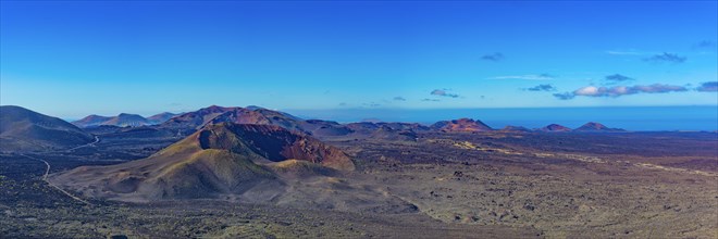 Panorama from the crater rim of Caldera Blanca to the fire mountains in Parque National de Timanfaya