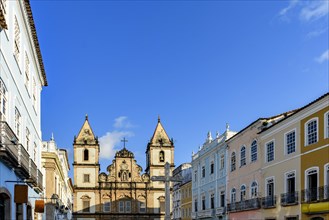 Facades of old and historic church and houses in colonial and baroque style in the tourist center of Pelourinho