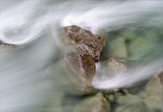 Water flowing over stones
