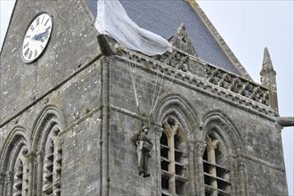 Parachute Memorial in honour of paratrooper John Steele who was caught on the church spire during D-Day