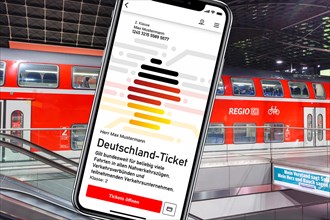 Germany ticket D-ticket or 49 euro ticket on a mobile phone with regional train Regional train photo montage in Berlin