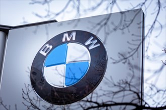A sign of the car manufacturer BMW in front of a branch in Siemensstadt in Berlin