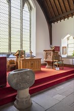 Interior showing stone baptismal font