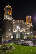 Cathedral Basilica of Our Lady of Peace in Neoclassical style at the plaza 10 de Noviembre at night in the city Potosi