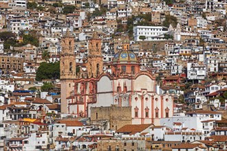 View over the colonial city centre of Taxco de Alarcon and the 18th century Church of Santa Prisca