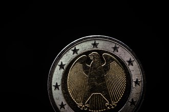 Symbolic photo: The federal eagle is shown on euro coin.Berlin
