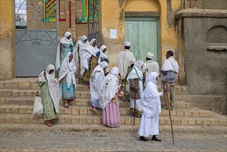 Churchgoers dressed in white leaving the Arabtu Ensessa Church