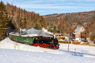 Fichtelbergbahn Railway steam train in winter in Oberwiesenthal