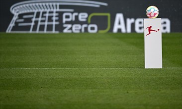 Adidas Derbystar match ball lies on pedestal in front of logo of PreZero Arena