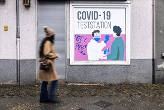 A person signs off at a closed test centre for Corona in Berlin