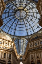 Glass dome roof and frescoes in the Galleria Vittorio Emanuele II
