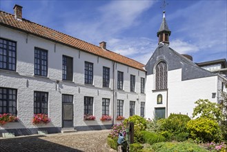 White beguines' houses and chapel in courtyard of the Beguinage of Oudenaarde