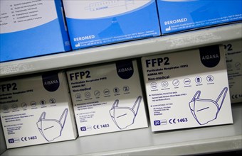 Packed FFP2 masks lying in a compartment in a COVID-19 vaccination and testing centre at Autohaus Olsen in Iserlohn