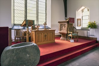 Interior showing stone baptismal font