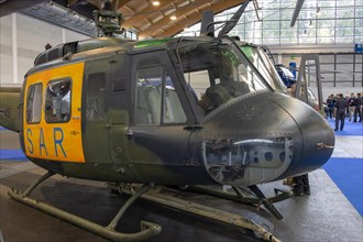 Detail of a Bundeswehr SAR helicopter with cockpit and orange doors