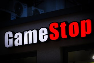 A lettering of the retailer GameStop is seen above the entrance of a shop in Duesseldorf