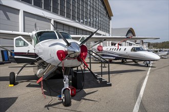 Business jets are lined up in front of the exhibition halls during the international trade fair for general aviation AERO Friedrichshafen 2023