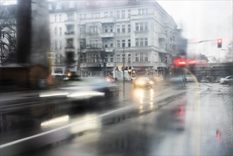 Road traffic in the rain