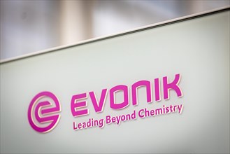 A sign of the evonik company at their headquarters in Essen